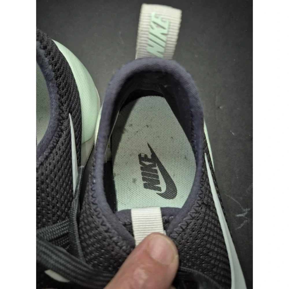 Nike women's tennis shoe navy with seafoam green‎ swoosh logo sz 7.5 lightweight